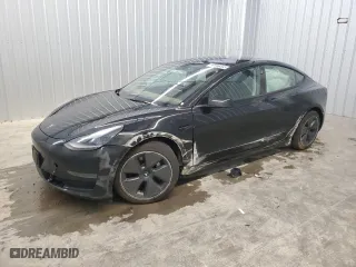 2022 Tesla Model 3 with VIN 5YJ3E1EA1NF369254, listed as a Copart auction lot 53467585 with 57,694 mi miles and Clean Title. Bid and sale history available at carsss.com. Image 1.
