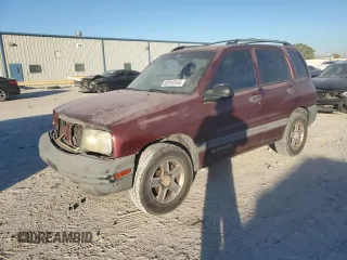 2003 Chevrolet Tracker z VIN 2CNBE13C336934957, wystawiony jako Copart lot #82918144 z przebiegiem 168 287 mil mil oraz Szkoda całkowita • Salvage title. Historia ofert i sprzedaży dostępna na DreamBid. Obrazek 1.