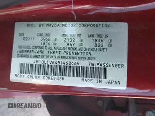 2011 Mazda Mazda3 i Touring with VIN JM1BL1VG4B1468466, listed as a IAAI auction lot 42099326 with 165,821 mi miles. Bid and sale history available at carsss.com. Image 9.