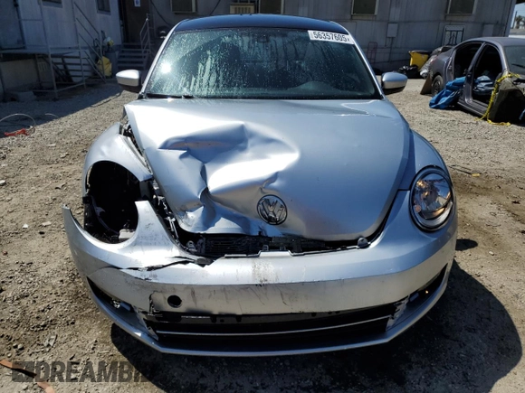 2016 Volkswagen Beetle with VIN 3VWF07AT9GM619860, listed as a Copart auction lot 56357605 with 67,212 mi miles and Salvage Title. Bid and sale history available at DreamBid. Image 5.