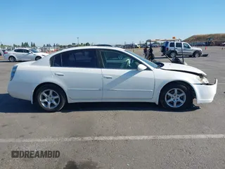 2005 Nissan Altima SE-R with VIN 1N4BL11D65C277397, listed as a IAAI auction lot 42299085 with 150,295 mi miles and . Bid and sale history available at DreamBid. Image 14.