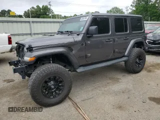 2021 Jeep Wrangler Unlimited Sahara High Altitude with VIN 1C4HJXEM1MW733598, listed as a Copart auction lot 50607804 with 50,587 mi miles and . Bid and sale history available at DreamBid. Image 1.
