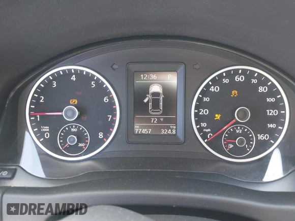 2013 Volkswagen Tiguan SEL with VIN WVGBV3AX1DW595673, listed as a IAAI auction lot 42140263 with 77,457 mi miles and . Bid and sale history available at DreamBid. Image 7.
