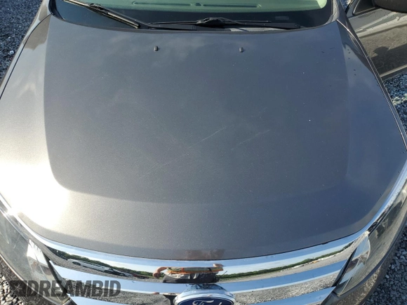 2012 Ford Fusion SEL with VIN 3FAHP0JA7CR387288, listed as a Copart auction lot 56968885 with 169,802 mi miles and Salvage title. Bid and sale history available at DreamBid. Image 11.