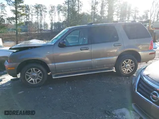 2003 Mercury Mountaineer Convenience with VIN 4M2DU66W93UJ19077, listed as a IAAI auction lot 41296559 with 164,143 mi miles. Bid and sale history available at carsss.com. Image 14.