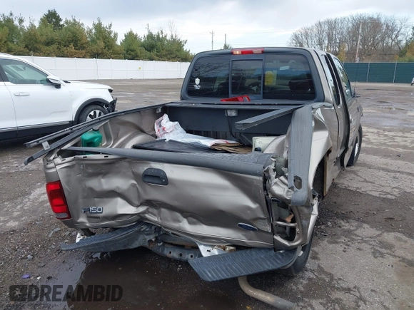 2003 Ford F-150 with VIN 2FTRX17L13CA34390, listed as a IAAI auction lot 41869497 with 114,221 mi miles and . Bid and sale history available at DreamBid. Image 4.