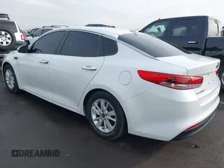 2016 Kia Optima LX with VIN KNAGT4L39G5103589, listed as a IAAI auction lot 41586470 with 104,351 mi miles and . Bid and sale history available at carsss.com. Image 3.