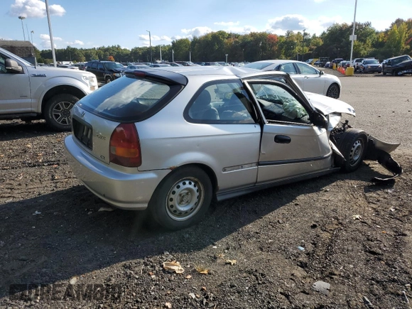 1998 Honda Civic CX with VIN 2HGEJ6427WH121499, listed as a Copart auction lot 73657704 with 101,999 mi miles and Salvage Title. Bid and sale history available at DreamBid. Image 3.