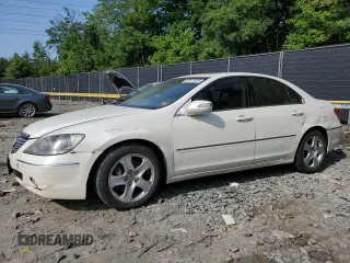 2005 Acura RL with VIN JH4KB16555C014217, listed as a Copart auction lot 59877005 with 311,406 mi miles and Salvage title. Bid and sale history available at DreamBid. Image 1.