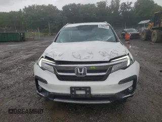 2021 Honda Pilot Touring 7-Passenger z VIN 5FNYF6H64MB004962, wystawiony jako Copart lot #57860225 z przebiegiem 52 311 mil mil oraz Szkoda całkowita • Salvage title. Historia ofert i sprzedaży dostępna na DreamBid. Obrazek 5.