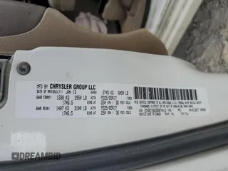 2013 Chrysler Town & Country Touring z VIN 2C4RC1BG3DR674413, wystawiony jako Copart lot #55902355 z przebiegiem 131 434 mil mil oraz Szkoda całkowita • Salvage title. Historia ofert i sprzedaży dostępna na DreamBid. Obrazek 13.