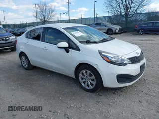 2015 Kia Rio LX with VIN KNADM4A33F6507001, listed as a IAAI auction lot 41675990 with 1 mi miles. Bid and sale history available at carsss.com. Image 1.