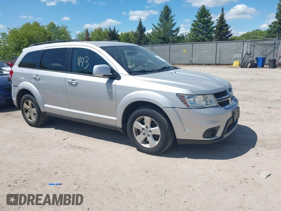 2012 Dodge Journey SXT z VIN 3C4PDCBGXCT390031, wystawiony jako IAAI lot #42281143 z przebiegiem 130 213 mil mil oraz . Historia ofert i sprzedaży dostępna na DreamBid. Obrazek 1.