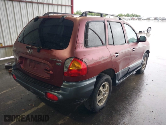 2004 Hyundai Santa Fe GLS with VIN KM8SC13E04U675340, listed as a IAAI auction lot 42181034 with 185,089 mi miles and . Bid and sale history available at DreamBid. Image 4.