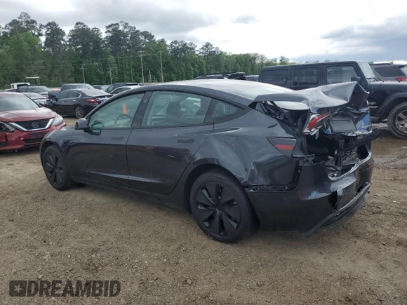 2024 Tesla Model 3 Long Range with VIN 5YJ3E1EB2RF825213, listed as a Copart auction lot 51909875 with 9,717 mi miles and Salvage Title. Bid and sale history available at DreamBid. Image 2.