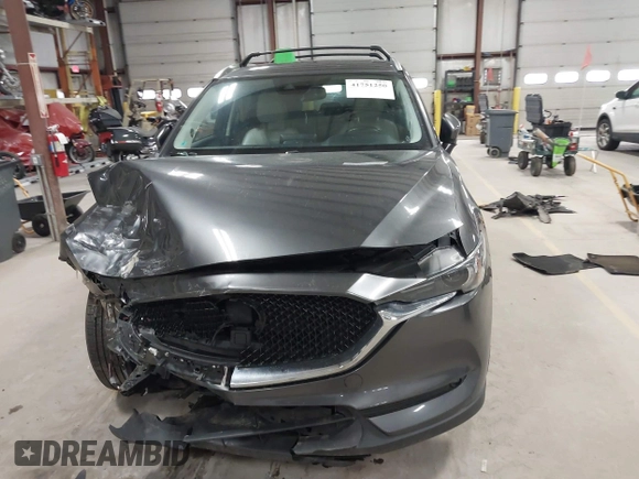 2020 Mazda CX-5 Grand Touring with VIN JM3KFBDM3L0739763, listed as a IAAI auction lot 41751250 with 88,063 mi miles and . Bid and sale history available at carsss.com. Image 12.