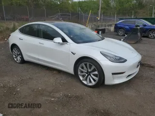2018 Tesla Model 3 Long Range Battery with VIN 5YJ3E1EAXJF165000, listed as a Copart auction lot 53806195 with 140,448 mi miles and Clean Title. Bid and sale history available at DreamBid. Image 4.