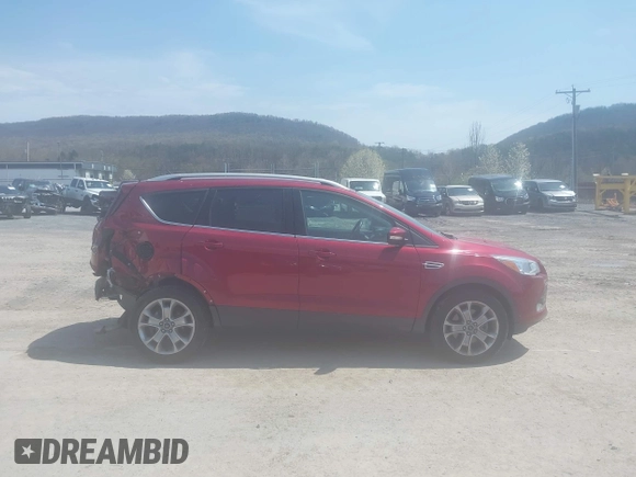 2015 Ford Escape Titanium with VIN 1FMCU9JX9FUB87463, listed as a IAAI auction lot 42059618 with 32,100 mi miles. Bid and sale history available at carsss.com. Image 13.