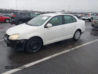 2009 Volkswagen Jetta S z VIN 3VWJZ71K49M129501, wystawiony jako IAAI lot #41461767 z przebiegiem 250 552 mil mil oraz . Historia ofert i sprzedaży dostępna na DreamBid. Obrazek 2.