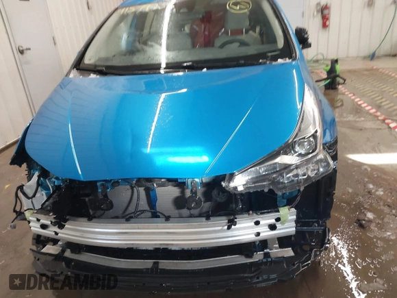 2021 Toyota Prius L Eco with VIN JTDKAMFU9M3135117, listed as a IAAI auction lot 41579736 with 35,795 mi miles and . Bid and sale history available at DreamBid. Image 13.