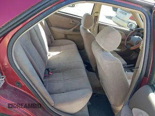 1998 Toyota Camry LE z VIN 4T1BG22K9WU367829, wystawiony jako IAAI lot #41820041 z przebiegiem 226 699 mil mil oraz . Historia ofert i sprzedaży dostępna na DreamBid. Obrazek 8.