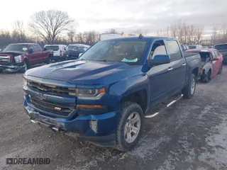 2016 Chevrolet Silverado 1500 LT with VIN 3GCUKREC8GG170387, listed as a IAAI auction lot 40974467 with 138,706 mi miles. Bid and sale history available at carsss.com. Image 2.