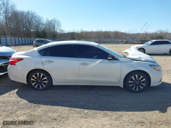 2017 Nissan Altima 2.5 SR with VIN 1N4AL3AP3HC160379, listed as a IAAI auction lot 41732588 with 103,647 mi miles. Bid and sale history available at carsss.com. Image 13.