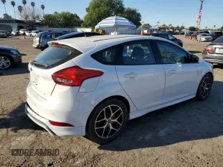 2015 Ford Focus SE with VIN 1FADP3K29FL334599, listed as a Copart auction lot 46926475 with 127,537 mi miles and Salvage Title. Bid and sale history available at DreamBid. Image 3.