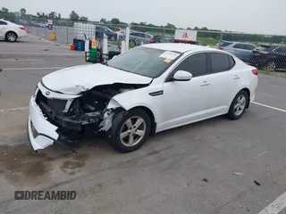 2014 Kia Optima LX with VIN KNAGM4A7XE5481131, listed as a IAAI auction lot 42494495 with 97,223 mi miles and . Bid and sale history available at DreamBid. Image 2.
