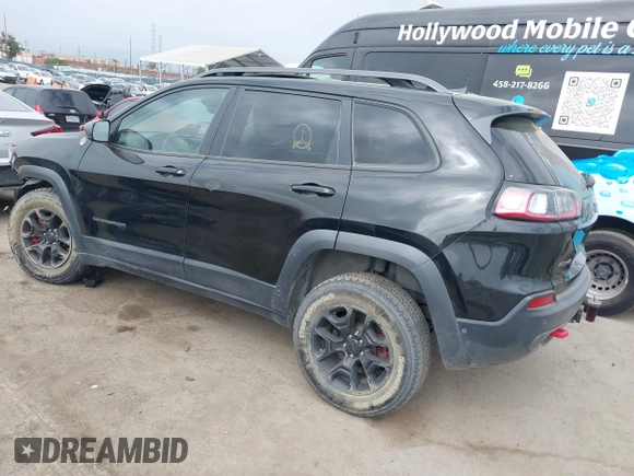 2019 Jeep Cherokee Trailhawk with VIN 1C4PJMBX6KD232515, listed as a IAAI auction lot 39495367 with 53,293 mi miles and . Bid and sale history available at DreamBid. Image 3.