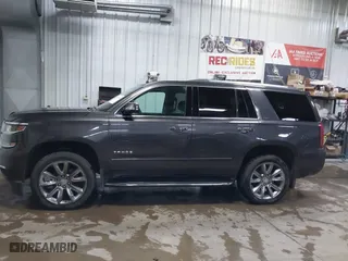 2016 Chevrolet Tahoe LTZ with VIN 1GNSKCKC7GR455033, listed as a IAAI auction lot 40811560 with 165,845 mi miles. Bid and sale history available at carsss.com. Image 14.