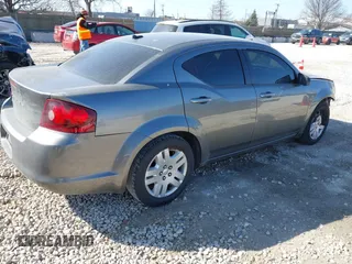 2013 Dodge Avenger SE with VIN 1C3CDZAB8DN596915, listed as a IAAI auction lot 41781939 with 122,440 mi miles and . Bid and sale history available at carsss.com. Image 4.