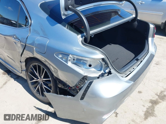 2023 Toyota Camry SE z VIN 4T1T11AK0PU833313, wystawiony jako IAAI lot #41743288 z przebiegiem 25 195 mil mil oraz . Historia ofert i sprzedaży dostępna na DreamBid. Obrazek 6.