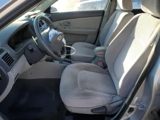 2008 Kia Spectra EX with VIN KNAFE121685507522, listed as a Copart auction lot 57908235 with 143,894 mi miles and Salvage title. Bid and sale history available at DreamBid. Image 7.
