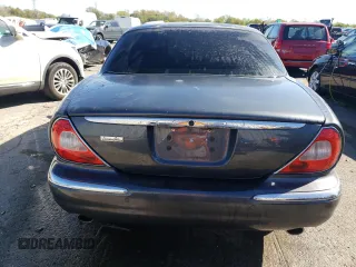 2005 Jaguar XJ VDP with VIN SAJWA82C65SG42753, listed as a Copart auction lot 73792534 with 141,936 mi miles and Salvage Title. Bid and sale history available at carsss.com. Image 6.