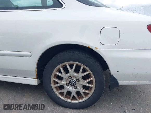 1999 Acura CL Premium z VIN 19UYA2257XL010037, wystawiony jako IAAI lot #42346496 z przebiegiem 116 203 mil mil oraz . Historia ofert i sprzedaży dostępna na DreamBid. Obrazek 6.