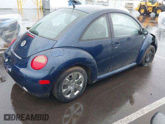 2003 Volkswagen New Beetle Coupe GL with VIN 3VWBK21C03M405877, listed as a IAAI auction lot 41851419 with 226,116 mi miles. Bid and sale history available at carsss.com. Image 4.