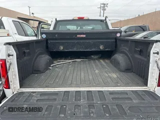 2015 Ford F-150 XL with VIN 1FTEX1CPXFKF08778, listed as a IAAI auction lot 41969338 with 217,479 mi miles. Bid and sale history available at carsss.com. Image 1.