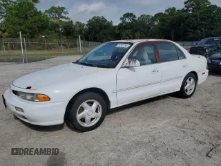 1995 Mitsubishi Galant ES with VIN 4A3AJ56G4SE193873, listed as a Copart auction lot 71312154 with 57,695 mi miles and Clean Title. Bid and sale history available at carsss.com. Image 1.