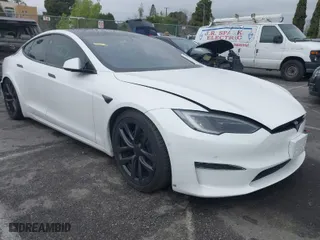 2022 Tesla Model S Plaid with VIN 5YJSA1E65NF488864, listed as a IAAI auction lot 41772788 with 33,915 mi miles. Bid and sale history available at carsss.com. Image 1.