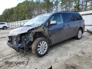 2014 Toyota Sienna LE with VIN 5TDJK3DC5ES093753, listed as a Copart auction lot 47452575 with 124,942 mi miles and Salvage Title. Bid and sale history available at carsss.com. Image 1.