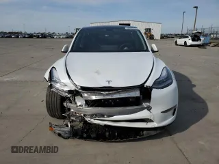 2023 Tesla Model Y Long Range z VIN 7SAYGDEE2PA065048, wystawiony jako Copart lot #48403655 z przebiegiem 56 553 mil mil oraz Szkoda całkowita • Salvage title. Historia ofert i sprzedaży dostępna na DreamBid. Obrazek 5.
