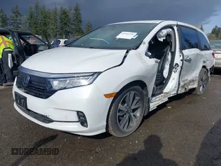 2021 Honda Odyssey Touring with VIN 5FNRL6H87MB015310, listed as a IAAI auction lot 41916339 with 58,808 mi miles. Bid and sale history available at carsss.com. Image 18.