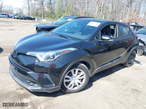 2019 Toyota C-HR XLE with VIN NMTKHMBX9KR086524, listed as a IAAI auction lot 41793289 with 56,866 mi miles. Bid and sale history available at carsss.com. Image 17.