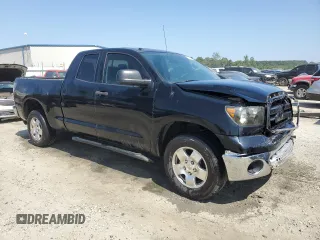 2011 Toyota Tundra 4WD Truck with VIN 5TFUM5F16BX016815, listed as a Copart auction lot 69013034 with 222,395 mi miles and Salvage Title. Bid and sale history available at carsss.com. Image 4.