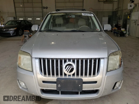 2008 Mercury Mariner Premier with VIN 4M2CU87108KJ13679, listed as a Copart auction lot 56635785 with 166,732 mi miles and Salvage title. Bid and sale history available at DreamBid. Image 5.