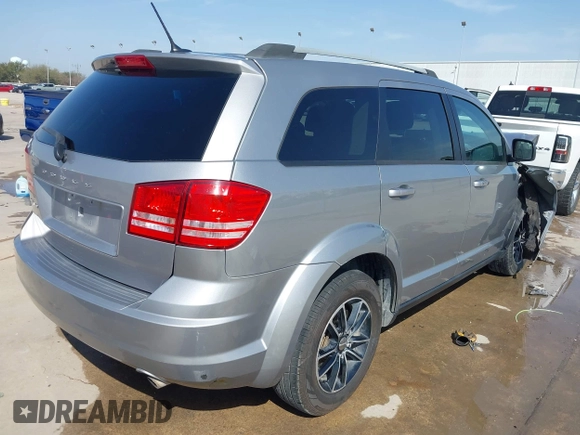 2017 Dodge Journey SE with VIN 3C4PDCABXHT662235, listed as a IAAI auction lot 41767844 with Not Provided miles and . Bid and sale history available at DreamBid. Image 4.