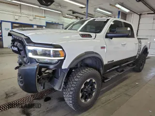 2020 Ram 2500 Power Wagon с VIN 3C6TR5EJ5LG126296, выставлен на аукционе Copart как лот 57616555 с пробегом 67 960 миль миль и Списание • Salvage title. История ставок и продаж доступна на DreamBid. Изображение 1.