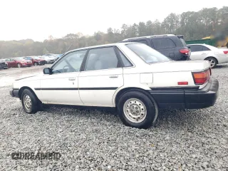 1988 Toyota Camry z VIN JT2SV21E7J3277138, wystawiony jako Copart lot #80039334 z przebiegiem 152 555 mil mil oraz Szkoda całkowita • Salvage title. Historia ofert i sprzedaży dostępna na DreamBid. Obrazek 2.