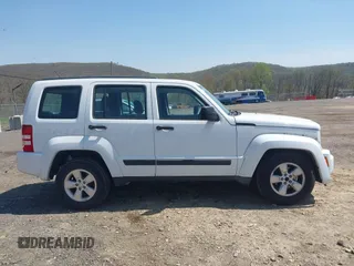 2012 Jeep Liberty Sport z VIN 1C4PJMAK7CW209305, wystawiony jako IAAI lot #42105378 z przebiegiem 136 617 mil mil oraz . Historia ofert i sprzedaży dostępna na DreamBid. Obrazek 13.